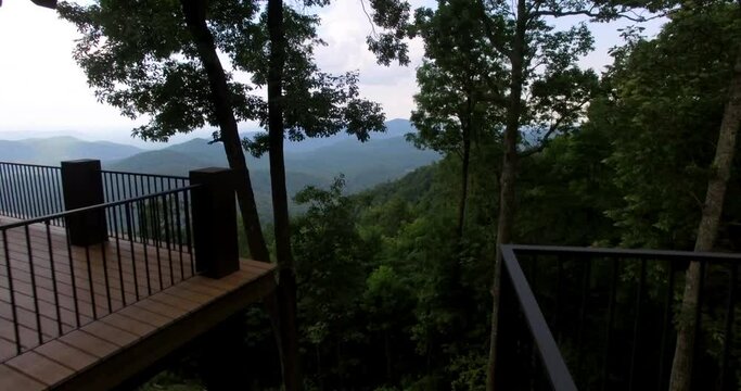 Drone shot of Blue Ridge Mountains off of a luxury porch outside Asheville, North Carolina