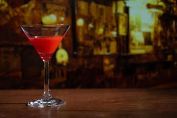 Closeup glass of Manhattan cocktail isolated decorated