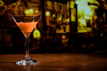 Closeup glass of Manhattan cocktail isolated decorated