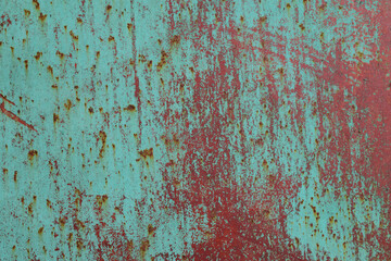 Wall with old paint for backdrop. Weathering, scratches, roughness. Pitting and rust. Color - Shadow Green, Bole, Hue Brown.