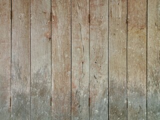 Hinged old wooden house door. Old wood texture. Vintage style.