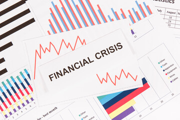Obraz premium Downward graphs representing financial crisis caused by coronavirus. Covid-19