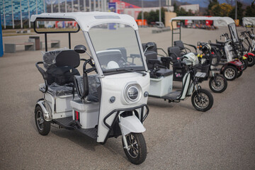 Electric motorcycles are in a row.