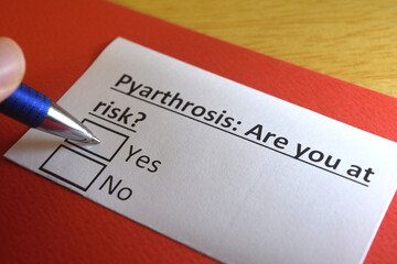 Fototapeta premium One person is answering question about pyarthrosis.