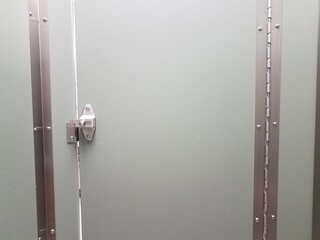 locked or latched bathroom or restroom stall door - obrazy, fototapety, plakaty