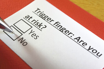 Fototapeta premium One person is answering question about trigger finger.
