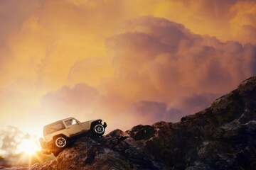 Four by four off road car crossing through the country road. Travel and racing concept for four wheel drive off road vehicle.
