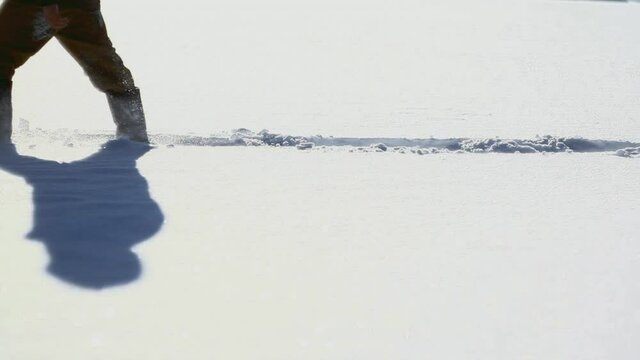 CU HA POV Man walking in snowshoes / Ural, Russia