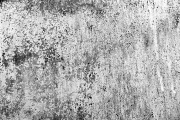 Texture of a concrete wall with cracks and scratches which can be used as a background