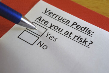 Obraz premium One person is answering question about verruca pedis.