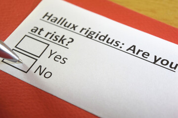 One person is answering question about hallux rigidus.