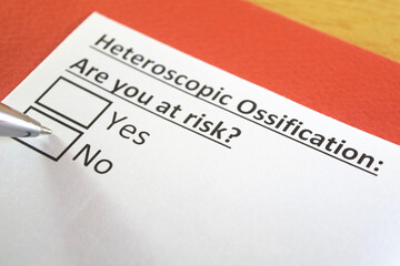 Fototapeta premium One person is answering question about heteroscopic ossification.