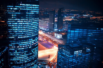 landscape skyscrapers night / business center in a night landscape, winter lights in the windows of...