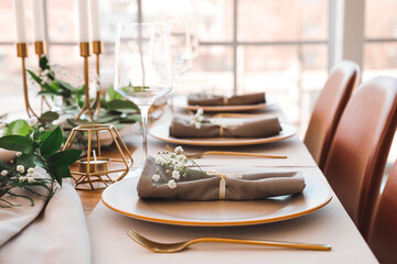 Beautiful table setting in dining room