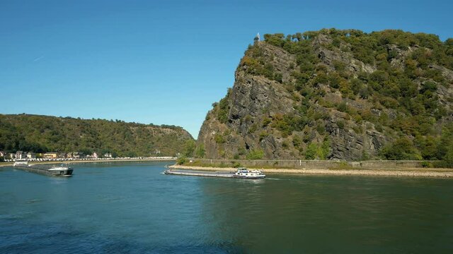 WS Barges on Rhine river in front of Lorelei Rock near st. Goarshausen / Rhine Valley, Rhineland-Palatinate, Germany
