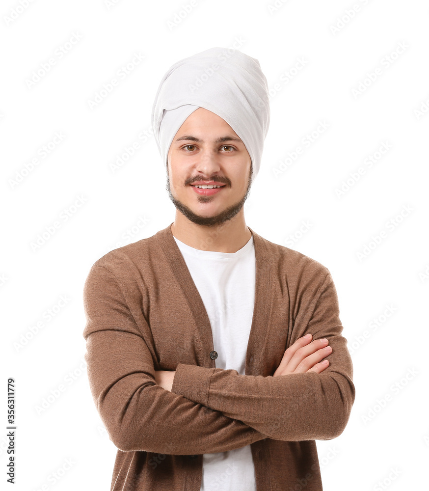 Wall mural Handsome young Indian man on white background