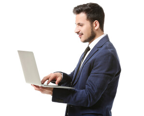 Handsome young businessman with laptop on white background