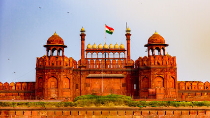 Red Fort is a historic fort UNESCO world Heritage Site at Delhi. On Independence day, the Prime Minister hoists Indian flag at main gate of fort & delivers nationally broadcast speech from its rampart - obrazy, fototapety, plakaty