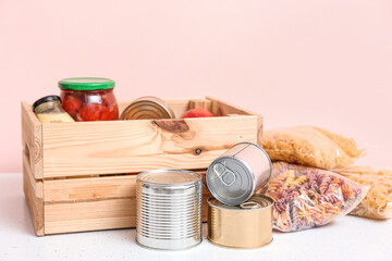Box with donations on table