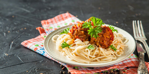 paste with meat meatballs in a plate on a table, selective focus, copy space
