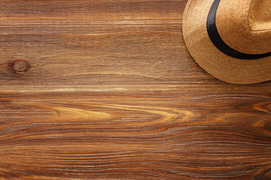 Father's day concept with fedora hat over wooden background. top view, flat lay