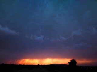Fototapeta premium sunset in the mountains, look like a fire rain in Rajasthan India 
