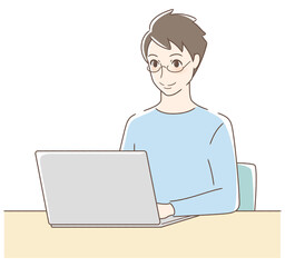 パソコンを操作して笑顔の男性