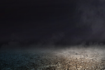 Cracked ground with smoke and fog