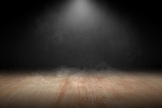 Wooden floor with smoke and light
