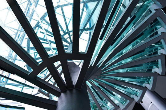 Metal spiral staircase with glass steps