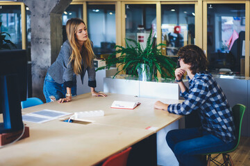 Group of male and female students preparing for lesson sharing thoughts 