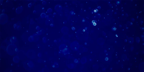 Fototapeta na wymiar blue abstract bokeh lights with soft light background. Blur wall