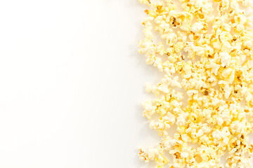 Popcorn on white background top view copy space