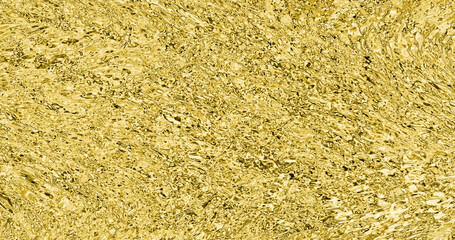 abstract shiny gold metal texture surface as creative background 