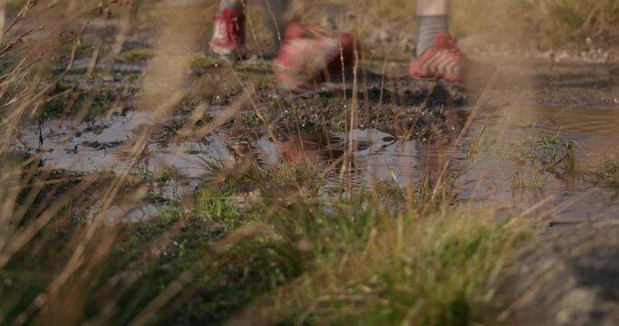 CU Feet of people running in landscape / Yorkshire Moors, Yorkshire, UK