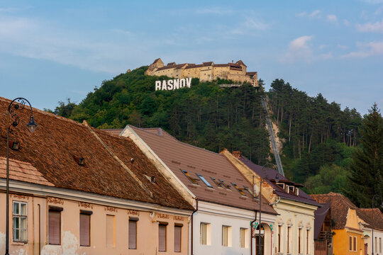 Beautiful view of Rasnov Fortress in Rasnov Town at sunset, Romania