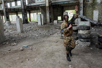 June 7, 2020, Ukraine, the city of Lviv. young boys and girls with an AK-47 rifle play airsoft. Active rest, sports 