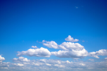 Naklejka na ściany i meble Blue sky with clouds. Blue sky background.