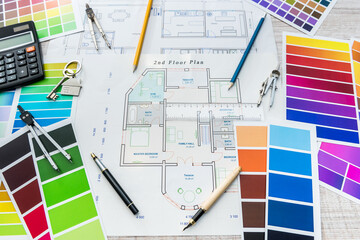 color samples and blueprint as architecture, interior design and renovation concept. Workplace Architect