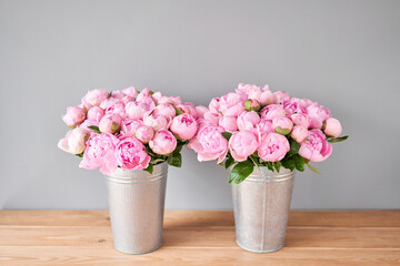 Pink Angel Cheeks peonies in a metal vase. Beautiful peony flower for catalog or online store. Floral shop concept . Beautiful fresh cut bouquet. Flowers delivery