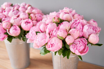 Pink Angel Cheeks peonies in a metal vase. Beautiful peony flower for catalog or online store. Floral shop concept . Beautiful fresh cut bouquet. Flowers delivery - obrazy, fototapety, plakaty