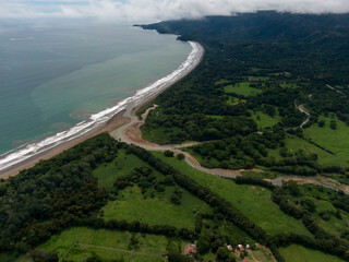 Fototapeta na wymiar Beautiful aerial view of the majestic whale tale in the beach of the National park Marino Ballena in Costa Rica 