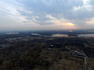 Aerial view of the countryside (drone image).Near river Desna.Winter time.Sunset. Kiev,Ukraine
