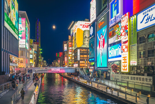 Osaka, Japan - November 21, 2018: night view of dotonbori, a principal tourist destinations in Osaka along the Dotonbori canal from Dotonboribashi Bridge to Nipponbashi Bridge
