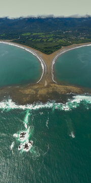 Beautiful aerial view of the majestic whale tale in the beach of the National park Marino Ballena in Costa Rica 