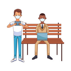 interracial men wearing medical masks using technology seated in park chair