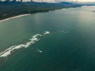 Beautiful aerial view of the majestic whale tale in the beach of the National park Marino Ballena in Costa Rica 