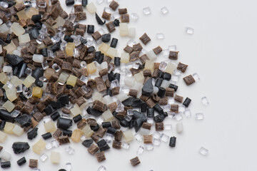 brown, black white an transparent polymer granulate and regrind for injection moulding industry