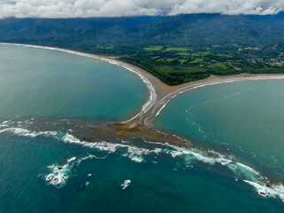 Beautiful aerial view of the majestic whale tale in the beach of the National park Marino Ballena...