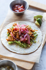 Authentic mexican tacos with pork meat and vegetables